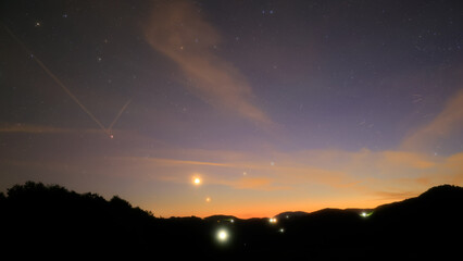 Crescent Moon, planet conjunction and landscape scenery silhouettes. © astrosystem