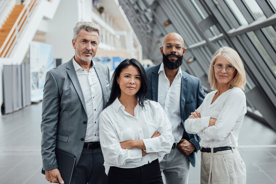 A business team attends a corporate trade fair