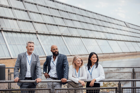 Colleagues take a break outside during a trade fair