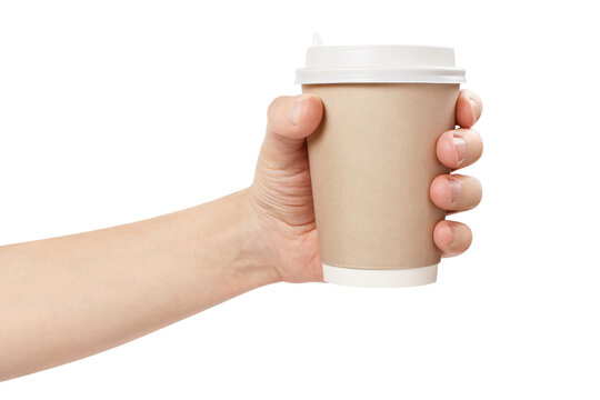 Hand holding blank kraft paper coffee cup with white lid, isolated on transparent cutout background