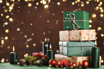 Fototapeta premium Christmas and New Year holiday gift stack with festive decorations
