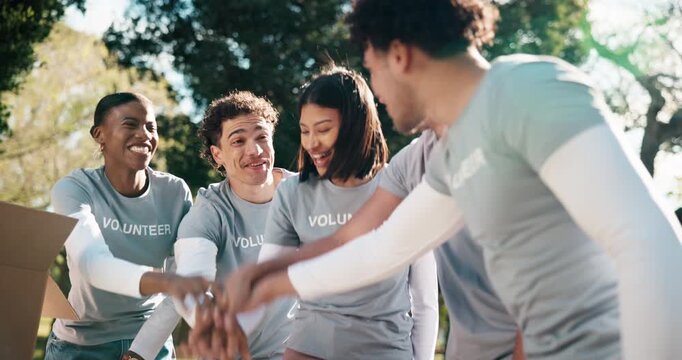 Volunteer, hands together and excited in park for charity, NGO collaboration and applause for goal. People, happy and outdoor with huddle for community service, teamwork and motivation for outreach