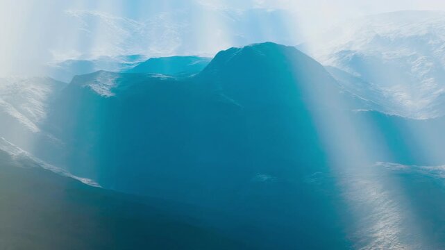 Gentle rays of sunlight filter through the mist, illuminating a serene mountain range. The scene captures tranquility and the beauty of nature in a breathtaking display.