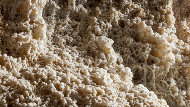 White calcite flowstone macro cave mineral detai