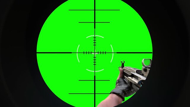 First person shooter sniper scope aiming at bright green screen video footage backdrop on white background