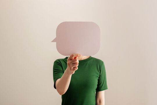 Woman holding a blank speech bubble,freedom of expression, communication