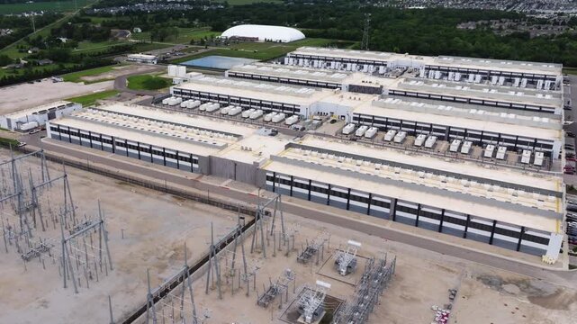 Orbiting Drone Shot Above Hyperscale Data Center in American Suburban Neighborhood