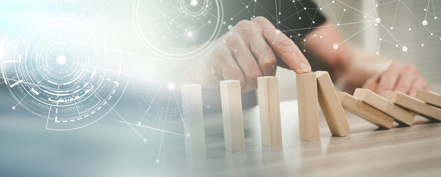 Concept of business control by stopping domino effect; panoramic banner