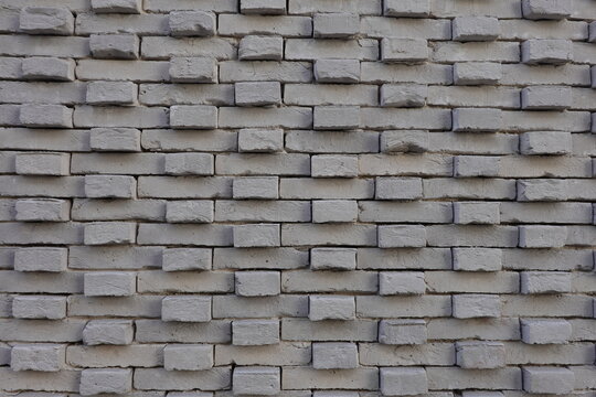 Mur de parement en briques grises avec calepinage 3D