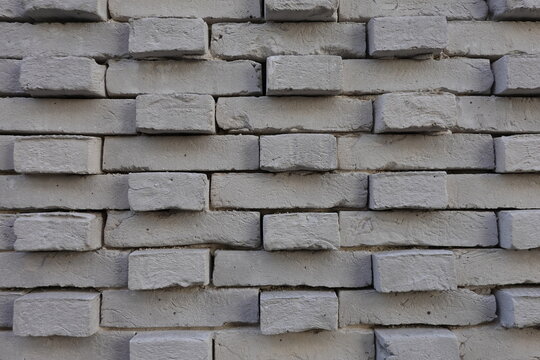 Mur de parement en briques grises avec calepinage 3D
