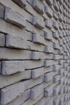 Mur de parement en briques grises avec calepinage 3D