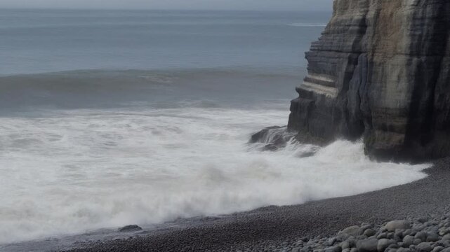 Powerful waves crashing on the miraflores lima cliff coast