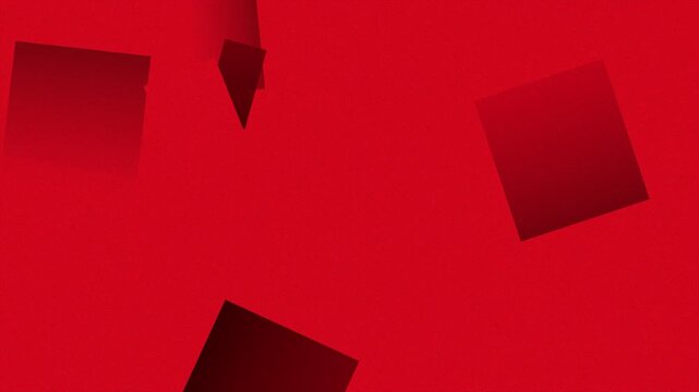 赤い背景に黒と暗赤色の四角形が浮かび移動と回転を繰り返すループ動画。Web広告やイベントのタイトル背景に映える抽象シネマティック素材