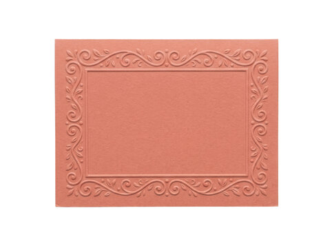 Rectangular dusty peach paper card featuring an embossed ornate vine and scroll border pattern along the margins transparent background
