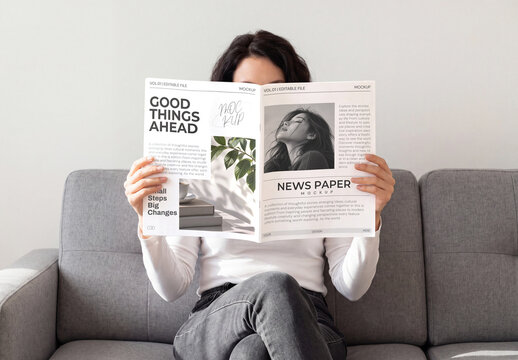 Woman Holding Open Newspaper Mockup
