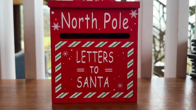 red santa mailbox with snow and lights, copyspace, concept of christmas, retail