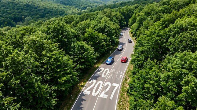 Cars driving on road with 2027 painted