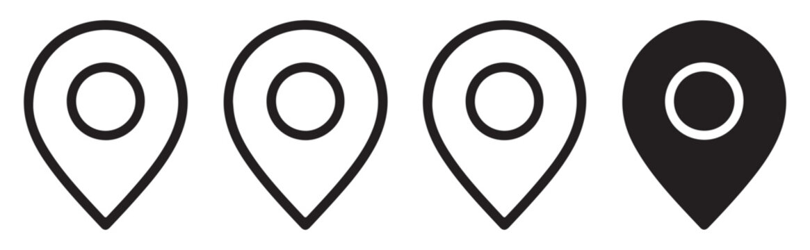 Set of black map pointer icons with circular hole design for navigation and web interface layout elements.