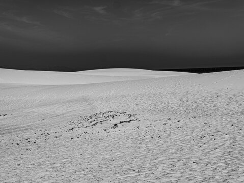 Black and white sand dune with smooth shadow