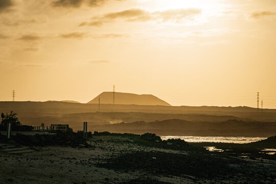 Sunset over a quiet coastal landscape