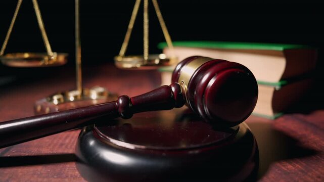 Wooden hammer and balance scales on a lawyer desk. Legislation, verdict and justice system concept