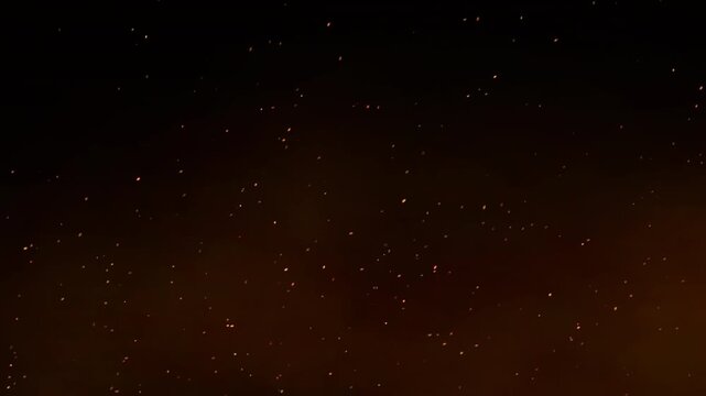Seamless loop of sharp, glowing fire sparks with highly varied trajectories, fanning out in multiple directions as they are blown by the wind, set against thick, voluminous orange smoke.
