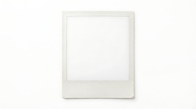 Off-white rectangular sheet with a white border mimicking an instant camera photo frame, blank inside and casting a subtle shadow on a clean white background.