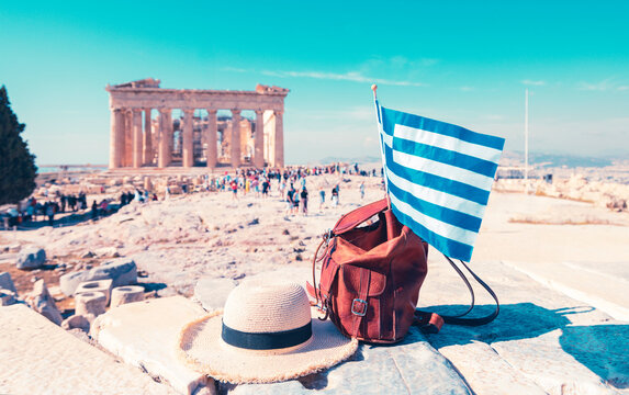 greek flag leather backpack straw hat acropolis parthenon background athens greece travel concept