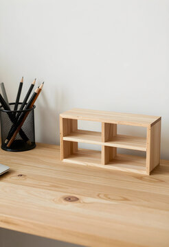 Minimalist workspace organization, wooden desk shelf and pencil holder for productivity and home office decluttering on a clean wooden table surface