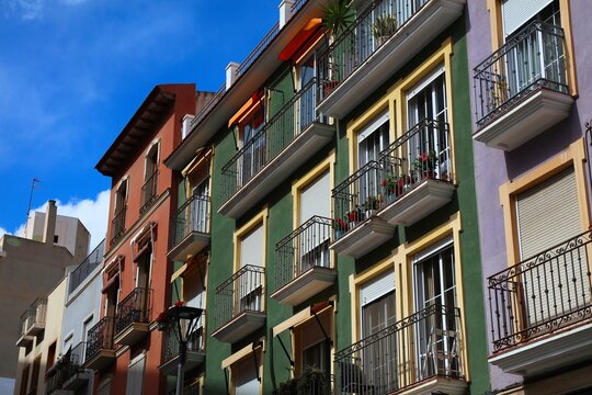 Architecture of Alicante, Spain. Street view of a typical old style residential apartment building.