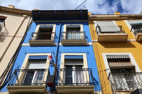 Architecture of Alicante, Spain. Street view of a typical old style residential apartment building.