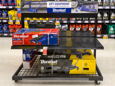 Aubrey, Texas, USA - September 22nd, 2026: Duralast low-profile trolley jack and aluminum off-road jack displaying inside AutoZone store