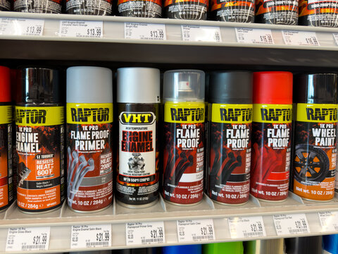 Aubrey, Texas, USA - September 22nd, 2026: Raptor and VHT engine enamel flame proof spray paint cans displaying inside AutoZone store