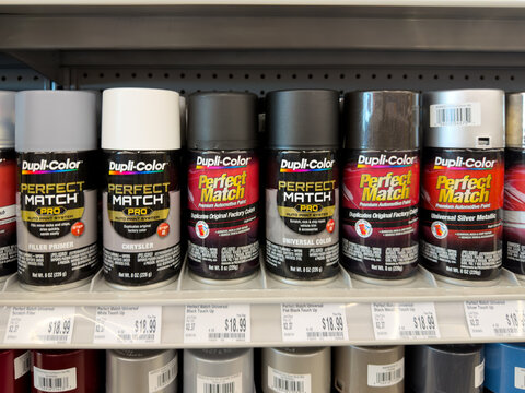 Aubrey, Texas, USA - September 22nd, 2026: Dupli-Color perfect match automotive paint spray cans displaying inside AutoZone store