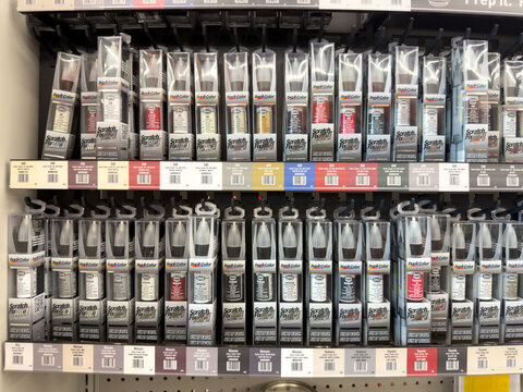 Aubrey, Texas, USA - September 22nd, 2026: Dupli-Color scratch fix all in 1 touch up paint pens displaying inside AutoZone store