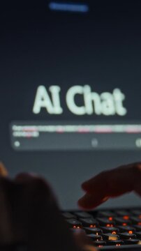 Hands of a man type a prompt into a computer chat interface, interacting with an AI model for information retrieval, representing human-machine communication via technology and computing software