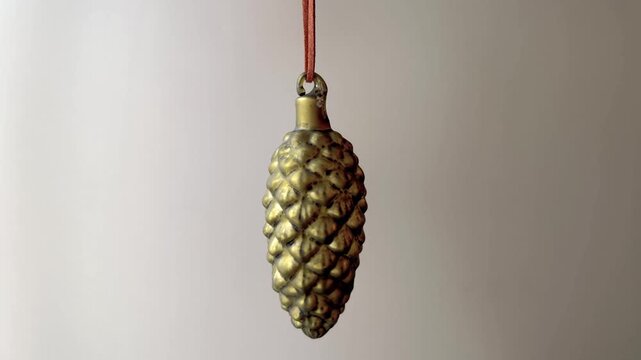 Glass Pine Cone Christmas Ornament in Green and Gold
