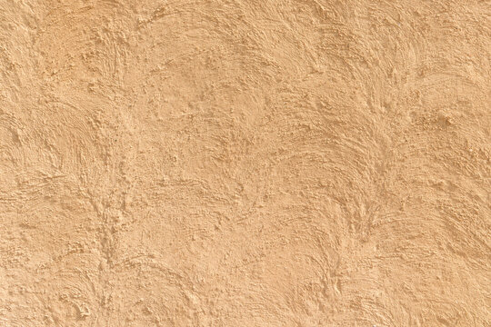 Old arabic antique beige stucco plaster wabi-sabi wall texture background