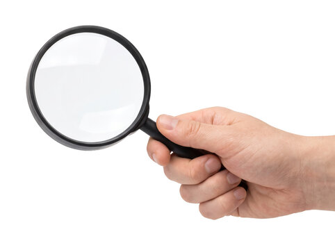 Hand Holding a Magnifying Glass for Inspection and Discovery