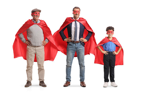 Kid and men of different generations posing in red superhero capes and masks