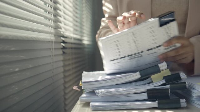 Busy Professional Woman Handling Office Paperwork Under Heavy Workload