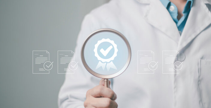 Medical insurance audit concept, claim assessment, quality assurance, compliance, certification, and healthcare protection. Doctor reviewing documents with a magnifying glass.