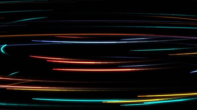 Fast colorful neon light streaks spinning across black space