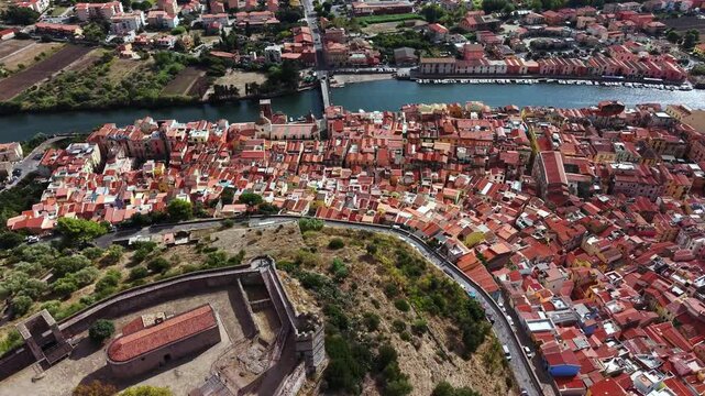 Wonderful aerial drone flight landscape of the old town Bosa in Sardinia, Province of Oristano, Italy, Europe	
