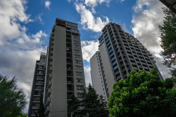 Fototapeta premium Exterior view of modern multi-story residential apartment buildings and urban environment in Tbilisi, Georgia, captured in September 2026.