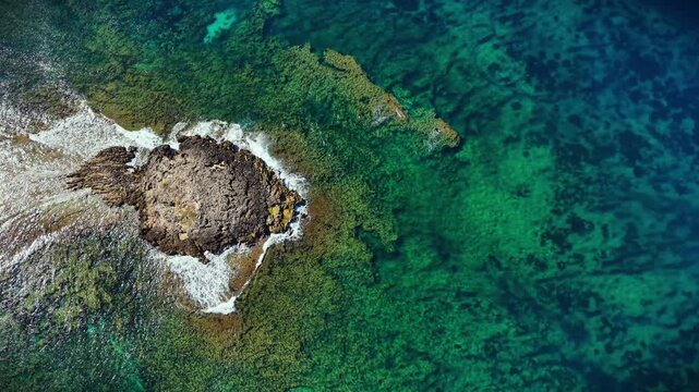  Scenic aerial drone flight landscape of Punta Bardoni, Is Arutas beach, Oristano, Sardinia, Italy