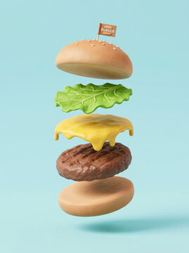 Exploded view of a delicious cheeseburger with floating ingredients on a light blue background.