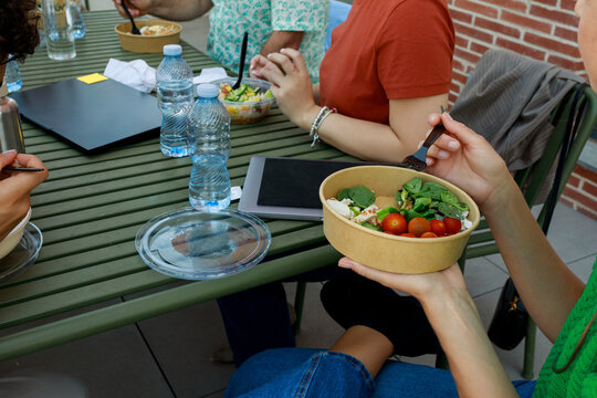 Group Enjoys Lunch With Salads and Water