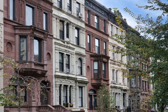 brownstone townhouses with bay windows in upper west side area of Manhattan