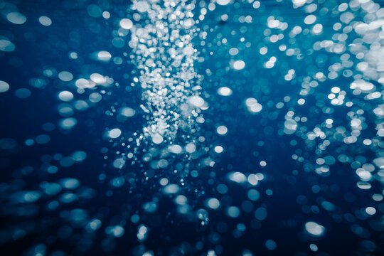 bright bubbles rising through turquoise water